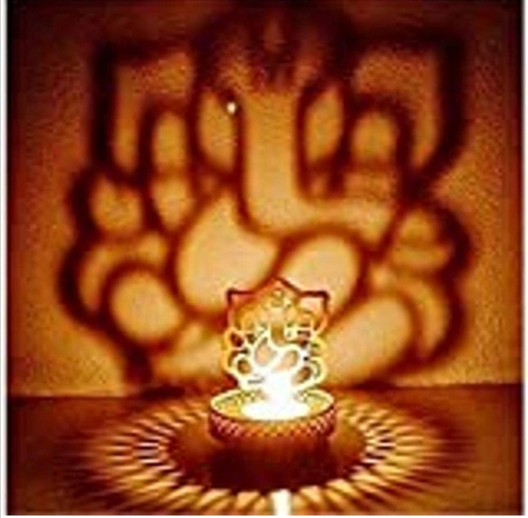 Iron Divine Shadow Ganesh Tealight Candle Holder